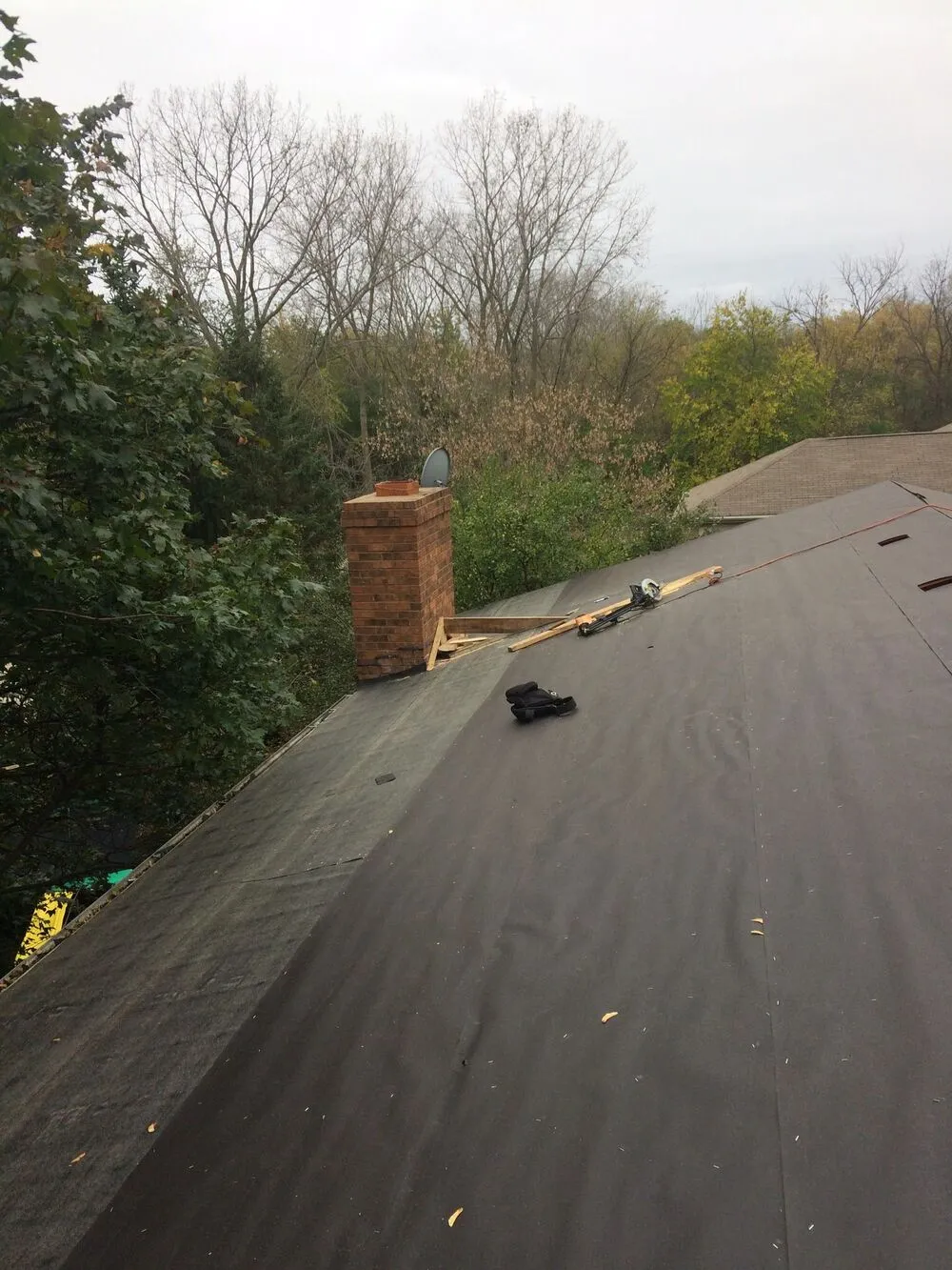 close up to the roof during new shingle roof installation