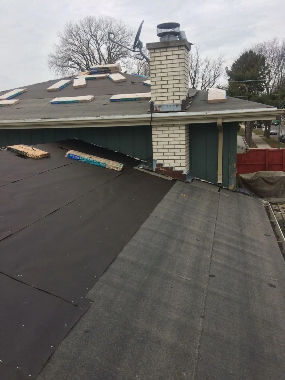 close up to the roof during shingle roof replacement